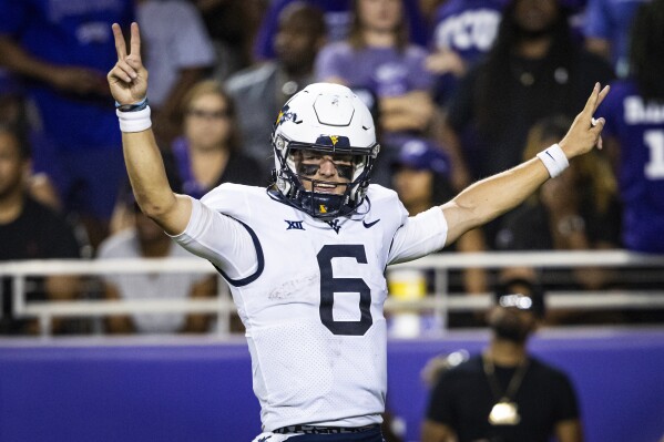 2 West Virginia football players carted off field are set to